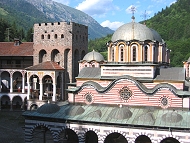 The principal church at the Rila Monastery and the Hrelyu Tower at left.